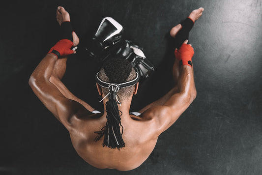 Top view of Muay Thai fighter on the ground.